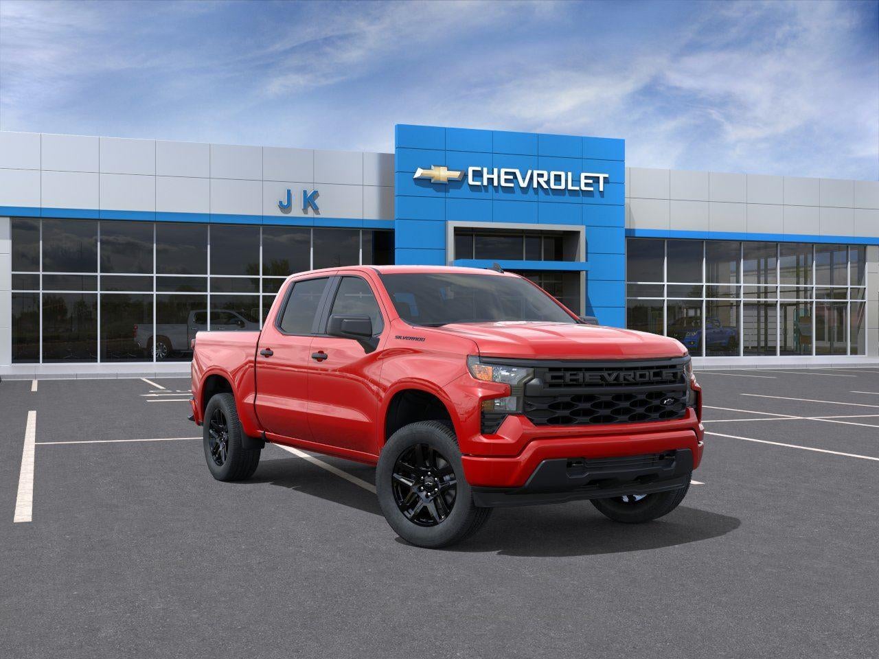 2026 Chevrolet Silverado 1500 Custom in Red Hot — front three-quarter view