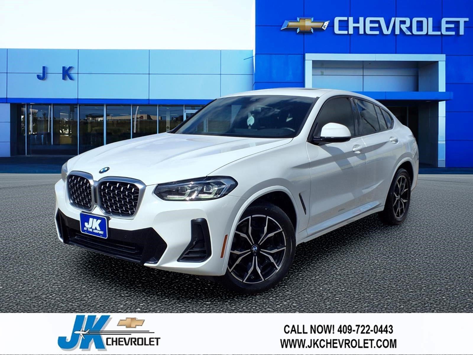 2023 BMW X4 xDrive30i in White — front three-quarter view