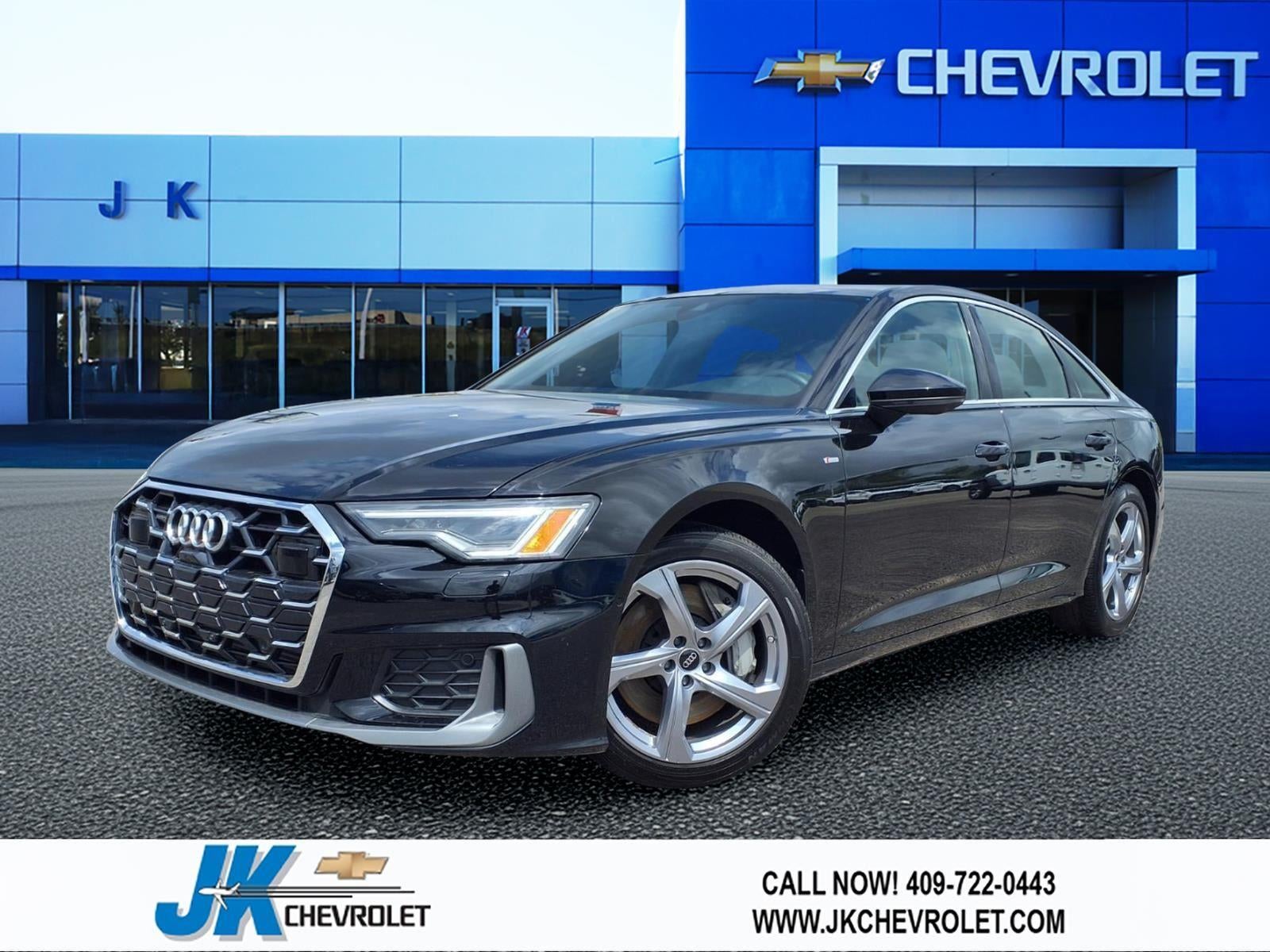 2024 Audi A6 Sedan Premium Plus in Black — front three-quarter view